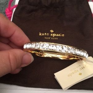 Kate Spade goldtone bracelet with crystal stones.